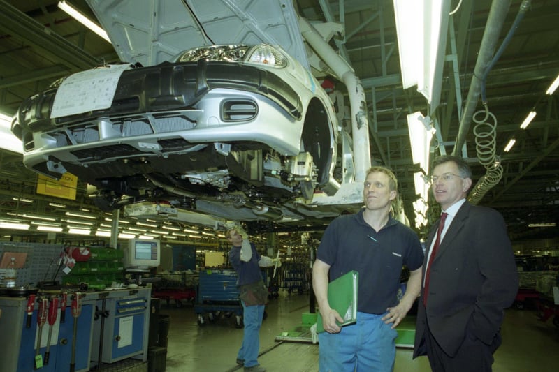 Right, Stephen Byers, the then trade and industry secretary, visits Nissan in 2001.