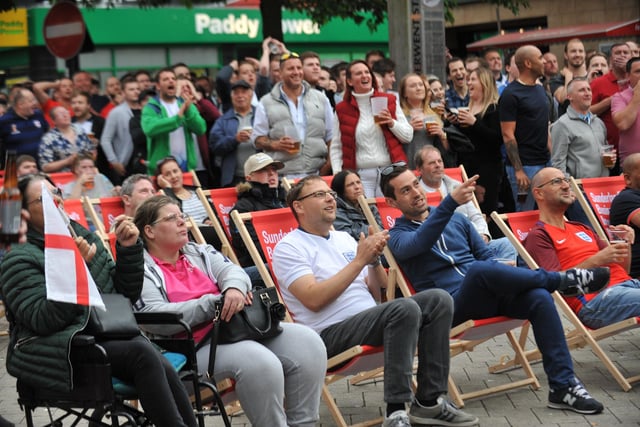 Fans watch England's opening 2018 World Cup match against Tunisia, at Sunderland's Park Lane Fanzone.