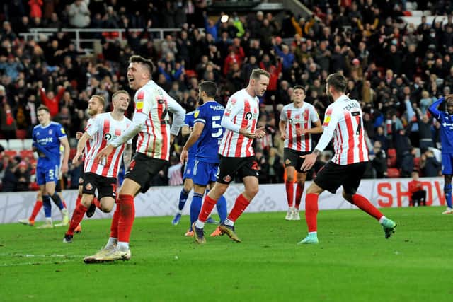 Aiden McGeady celebrates his stoppage-time penalty at the Stadium of Light