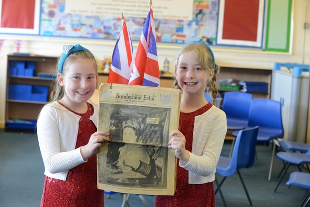 Fulwell Junior School pupils Emily and Charlotte Palmer, nine, with a copy of the Sunderland Echo from the day after the 1953 Coronation.