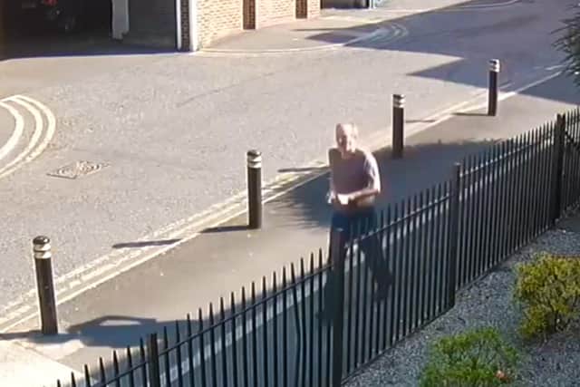 CCTV captured Thomas Smith following his victim before robbing her.