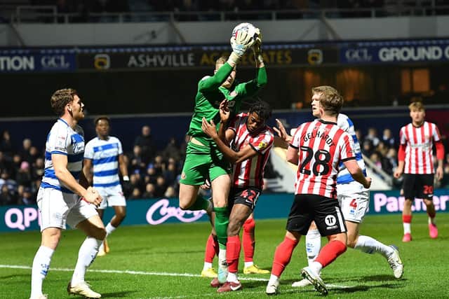 Anthony Patterson claims a cross at QPR