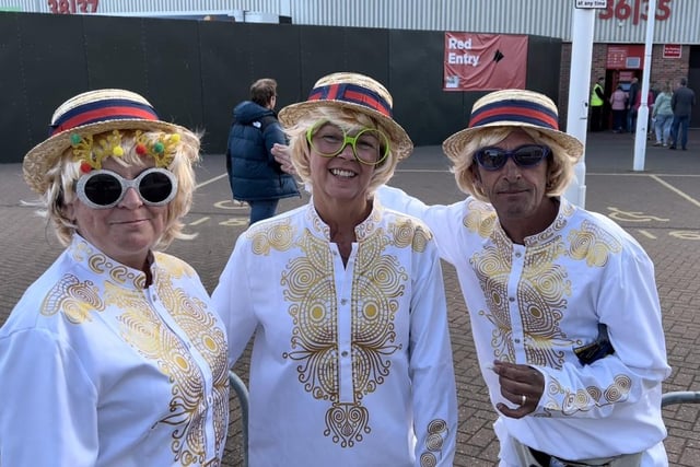Rachel Ellison, Barbara Cruddas and Derek Ellison dressed as Elton John at the Stadium of Light