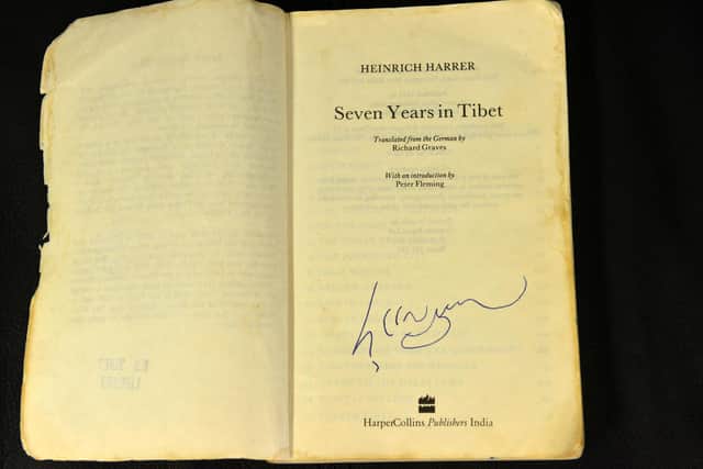 Elite Autographs in Houghton-le-Spring, including a book from the Dalai Lama.