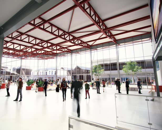 The new station will include new ticket booths, waiting rooms, shops and cafes.