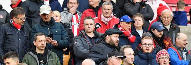 Sunderland fans in action at the Stadium of Light during the Black Cats' 1-0 loss to Cardiff City in the Championship.