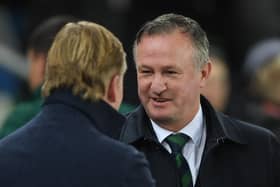 BELFAST, NORTHERN IRELAND - NOVEMBER 16: Northern Ireland manager Michael O'Neill greets his Dutch counterpart Ronald Koeman prior to the UEFA Euro 2020 qualifier between Northern Ireland  and The Netherlands at Windsor Park on November 16, 2019 in Belfast, Northern Ireland. (Photo by Mike Hewitt/Getty Images)