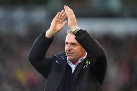 NORWICH, ENGLAND - NOVEMBER 20: Dean Smith, Manager of Norwich City acknowledges the fans prior to the Premier League match between Norwich City and Southampton at Carrow Road on November 20, 2021 in Norwich, England. (Photo by Harriet Lander/Getty Images)