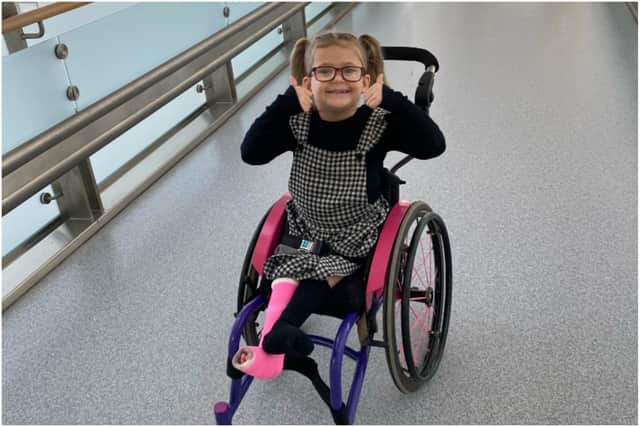 Rubie is delighted with her new wheelchair which will give her independence as she grows.