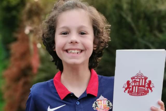 Sunderland fan George Henderson with his letter from Kyril Louis-Dreyfus.