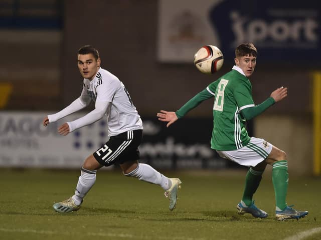 LURGAN, NORTHERN IRELAND - NOVEMBER 18: Erkan Akalp of Germany compete for the ball with Trai Hume of Northern Ireland during the u19 international friendly match between Germany and Northern Ireland on November 18, 2019 in Lurgan, Northern Ireland. (Photo by Charles McQuillan/Getty Images for DFB)