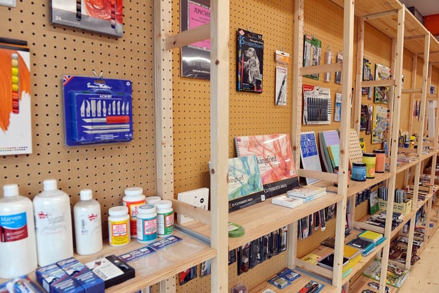 Craft knives, notebooks and painters' sketchbooks are on show.