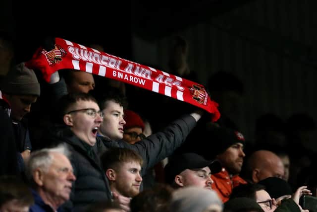 BIRKENHEAD, ENGLAND - JANUARY 29: A Sunderland fan shows his support during the Sky Bet League One match between Tranmere Rovers and Sunderland at Prenton Park on January 29, 2020 in Birkenhead, England. (Photo by Lewis Storey/Getty Images)