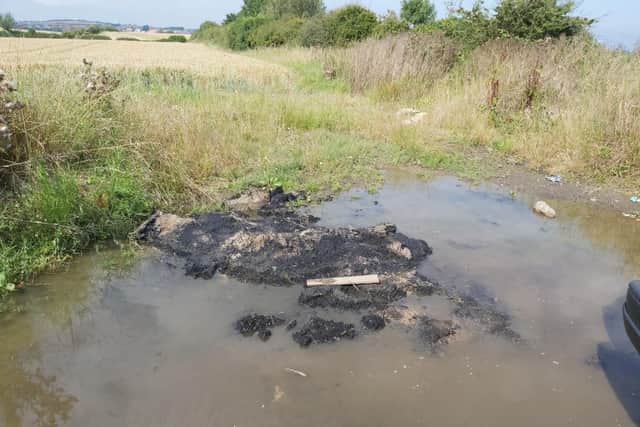 A photo shared by Durham County Council showing the tarmac which was dumped on Petwell Lane by George Turton.