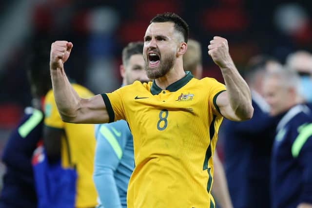 Bailey Wright of Australia celebrates their sides victory after a penalty shoot out following the 2022 FIFA World Cup Playoff match between Australia and Peru. Photo by Mohamed Farag/Getty Images)