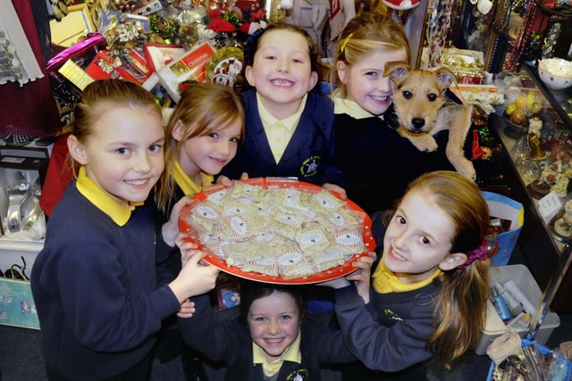 Fulwell Junior School pupils Lucy Archer 7, Lucy Goodings 8, Jamie Scrafton 7, Carys Kemp 8, Robyn Barker 7, and Eva Lowes 8; were selling reindeer dust to raise money for Pawz For Thought, in Fulwell Road, in 2012.