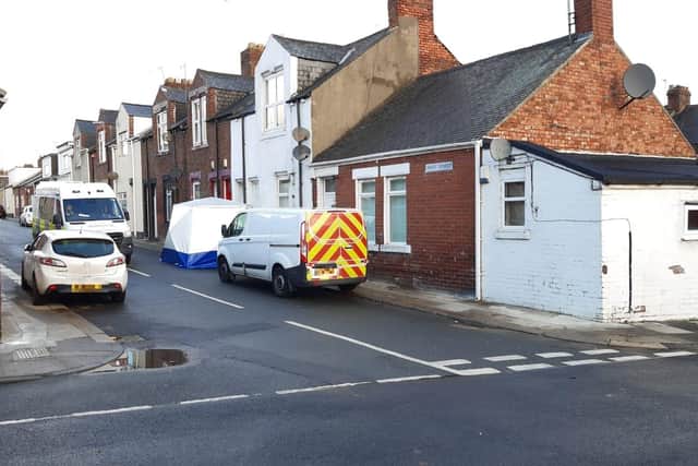 A police cordon remains in place today, December 5.