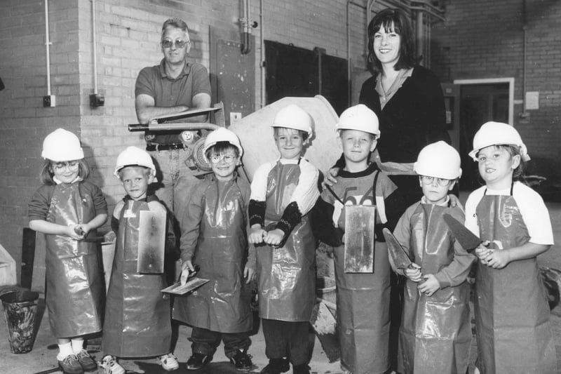 Pupils from Ward Jackson Primary School aged four to six visited the brick workshop at Stockton Street Campus of Hartlepool Further Education in 1997.  Left to right are:  Samantha Smith, Aaron Brady, Scott Dolman, Paul Thompson, Joe Langley, Vincent Matthews, Jodie Robinson with lecturer Peter Kirkpatrick and teacher Alison Fisher.