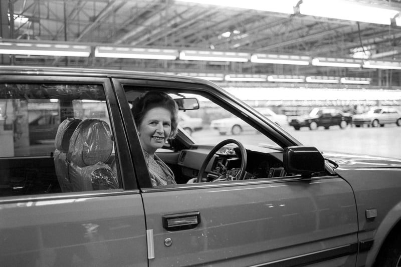 The then Prime Minister Margaret Thatcher at the wheel of a Bluebird car at the car plant after it was officially opened on September 8, 1986.
