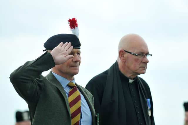 Event organiser Dave McKenna from The Seaham Remember Them Fund and ex-army Chaplin Father Kennedy pay their respects.