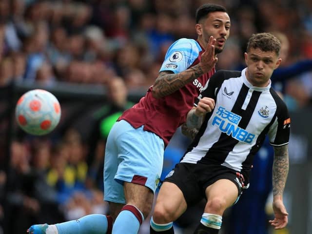 Newcastle United's English defender Kieran Trippier (R) vies with Burnley's English midfielder Dwight McNeil (L) during the English Premier League football match between Burnley and Newcastle United at Turf Moor in Burnley, north west England on May 22, 2022. (Photo by LINDSEY PARNABY/AFP via Getty Images)