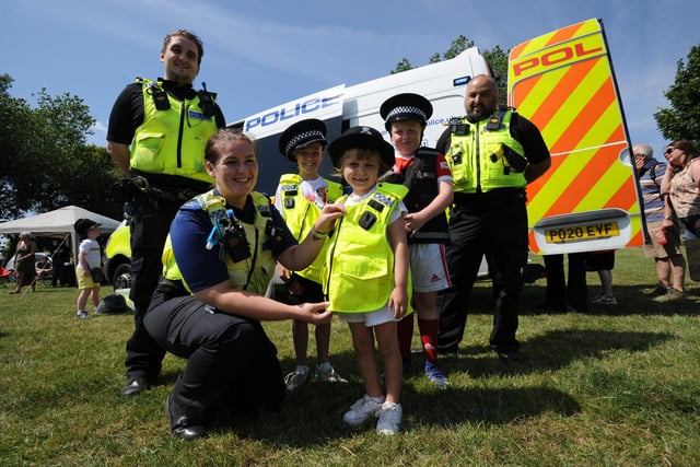 Bradley Lowery Foundation Family Fun Day, at Thompson Park, Sunderland - Nylah, Logan, and Riley Foot with neighbourhood police officers Lauren Smith, Kelvin Jones and Peter Rawlinson