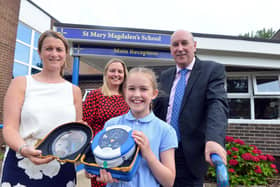 St Mary Magdalen's R C Primary School pupil Claudia Collings, 11 fundraised to get a defibrillator fitted at the school with help from headteacher Andrea Goodwin, mother Eloise Collings and Prof Michael Norton.