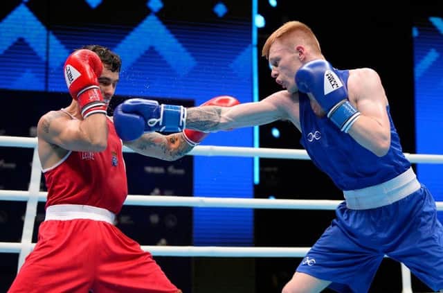 Britain's Kiaran Macdonald (blue) fights against Spain's Martin Molina Salvador (red) during their EUBC Men's European Boxing Championships 51 kg final bout in Yerevan, on May 30, 2022. (Photo by Karen MINASYAN / AFP) (Photo by KAREN MINASYAN/AFP via Getty Images)
