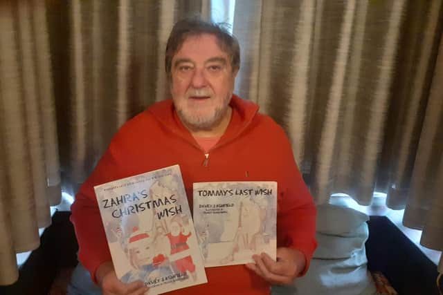 Davey Ashfield with the books which were illustrated by his friend Terry Greenwell.