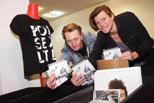 Setting up the shop in Fawcett Street - Dave Harper (left) and Frankie Francis.