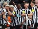 Joelinton, second left, celebrates his goal for Newcastle United against Tottenham Hotspur yesterday.
