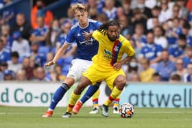 Joe Pigott of Ipswich Town and Jairo Riedewald of Crystal Palace battle for the ball during the pre-season friendly match.