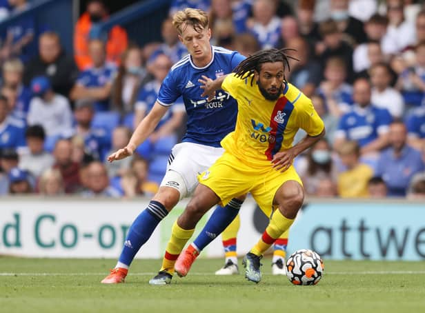 Joe Pigott of Ipswich Town and Jairo Riedewald of Crystal Palace battle for the ball during the pre-season friendly match.