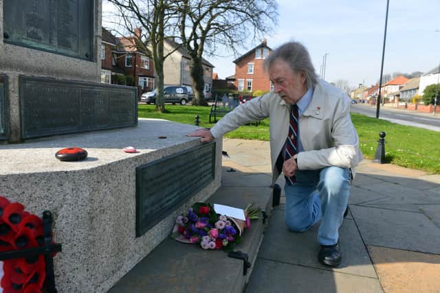 Alan Mitcheson pays tribute to Halifax bomber pilot Cyril Barton at Ryhope war memorial.