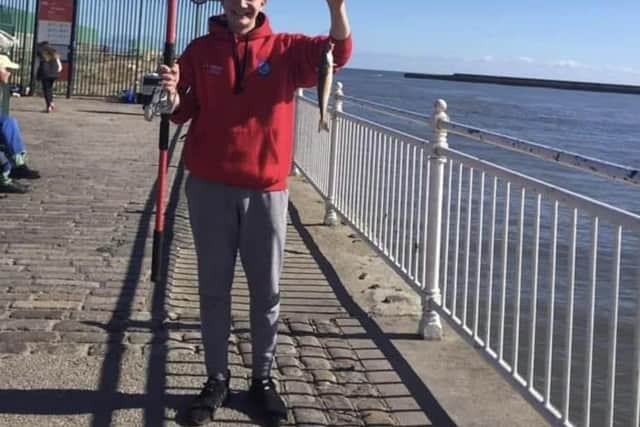 Val with a fish he caught on Roker seafront