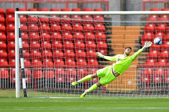 Lee Burge makes a fine save early in the 3-1 win over Gateshead