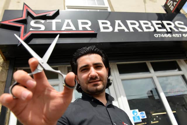 Star Barbers owner Shado Hasso is offering free hair cuts for people with disabilities.
