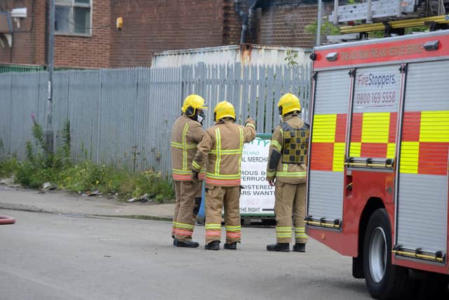 Firefighters at the scene of the Hendon Street factory fire.