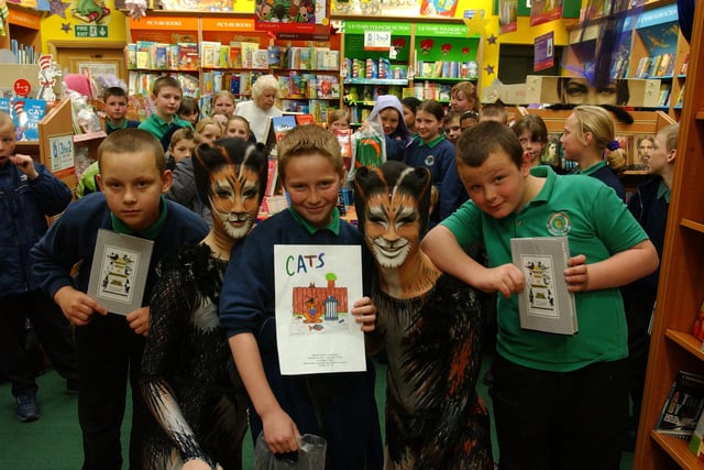 These Valley Road Primary School pupils won a Cats themed colouring competition and received their prize from members of the show's cast 19 years ago in Ottakars.