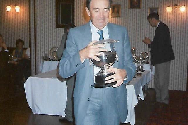 Harry receiving a golf trophy at Seaham Golf Club where he has been a member for 56 years.