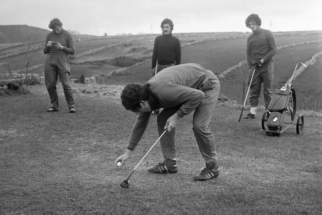 Joe Bolton gets ready to tee off in a game of golf with Jimmy Montgomery, Bobby Kerr, and Richie Pitt.