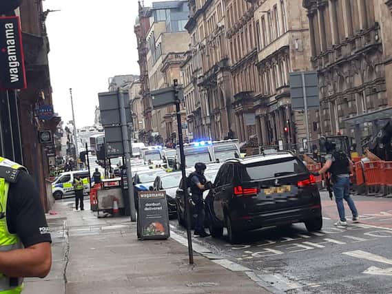 Photo taken with permission from the Twitter feed of @ThatReilz of police presence in West George Street, Glasgow, as a serious police incident has closed roads in the city centre. Picture c/o @ThatReilz/PA Wire