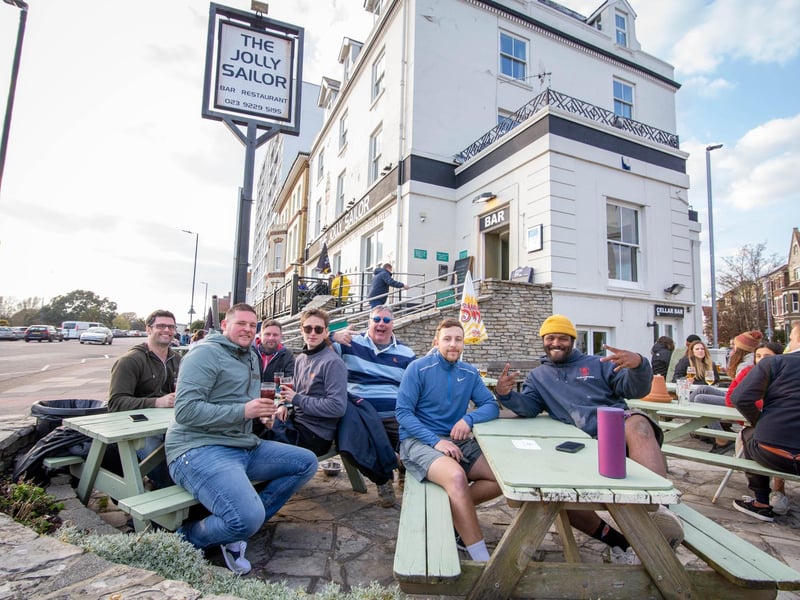 Friends enjoying a pint at the Jolly Sailor, Southsea