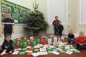 West Rainton Primary School pupils with their cards for elderly people in the area.