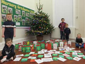 West Rainton Primary School pupils with their cards for elderly people in the area.