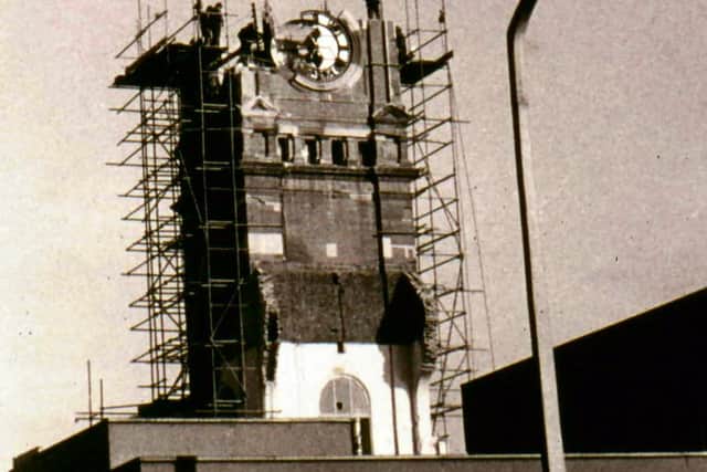 The demolition of the Town Hall clock.