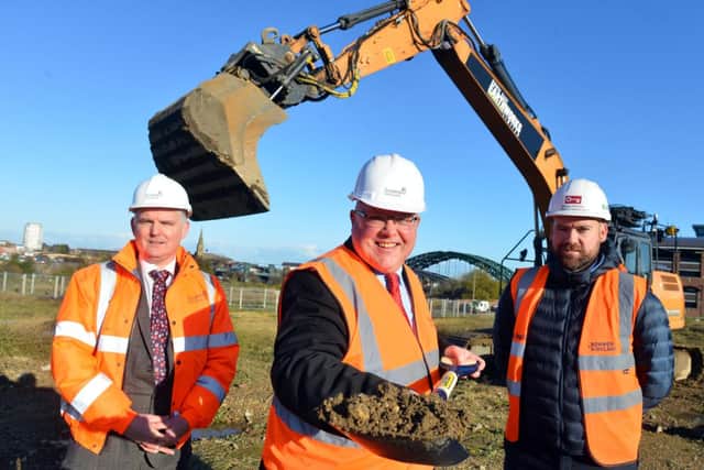 Councillor Graeme Miller, centre, with council chief executive Patrick Melia, left, and Paul Anderson, project manager for Bowmer and Kirkland, right, at the City Hall building site as work began.