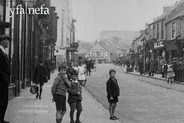 Plenty of faces on the streets of Houghton-le-Spring in the 1930s. Photo: North East Film Archive.