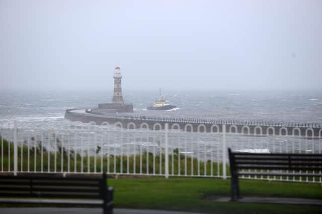 File pictures: Heavy rain fall and strong winds at Roker