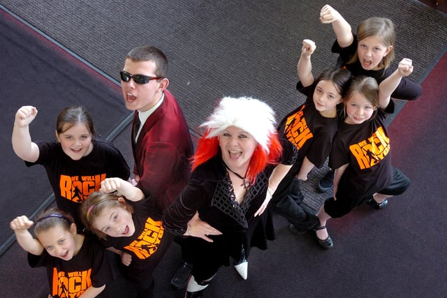 A performance of "We Will Rock You" at Southmoor School. Pictured in 2012 were John Appleton as Khashoggi and teacher Anne Twine as the Killer Queen with her assistants played by Year 5 pupils from Hill View Junior School; Natasha Hair, Josie Appleby, Emma Bell, Grace Kennedy, Faye Potts and Gracie Mitchell..